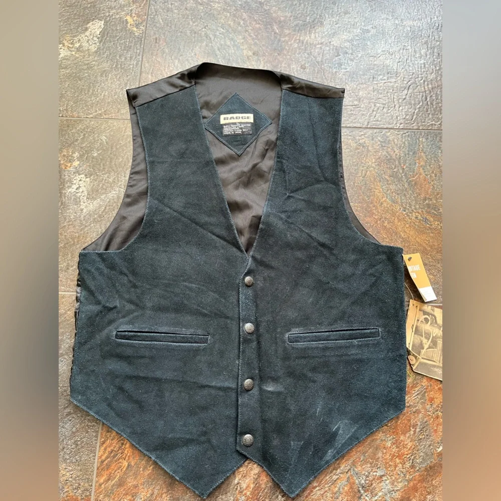 Vintage new men’s Badge blue leather suede vest with snap closure. Size large.